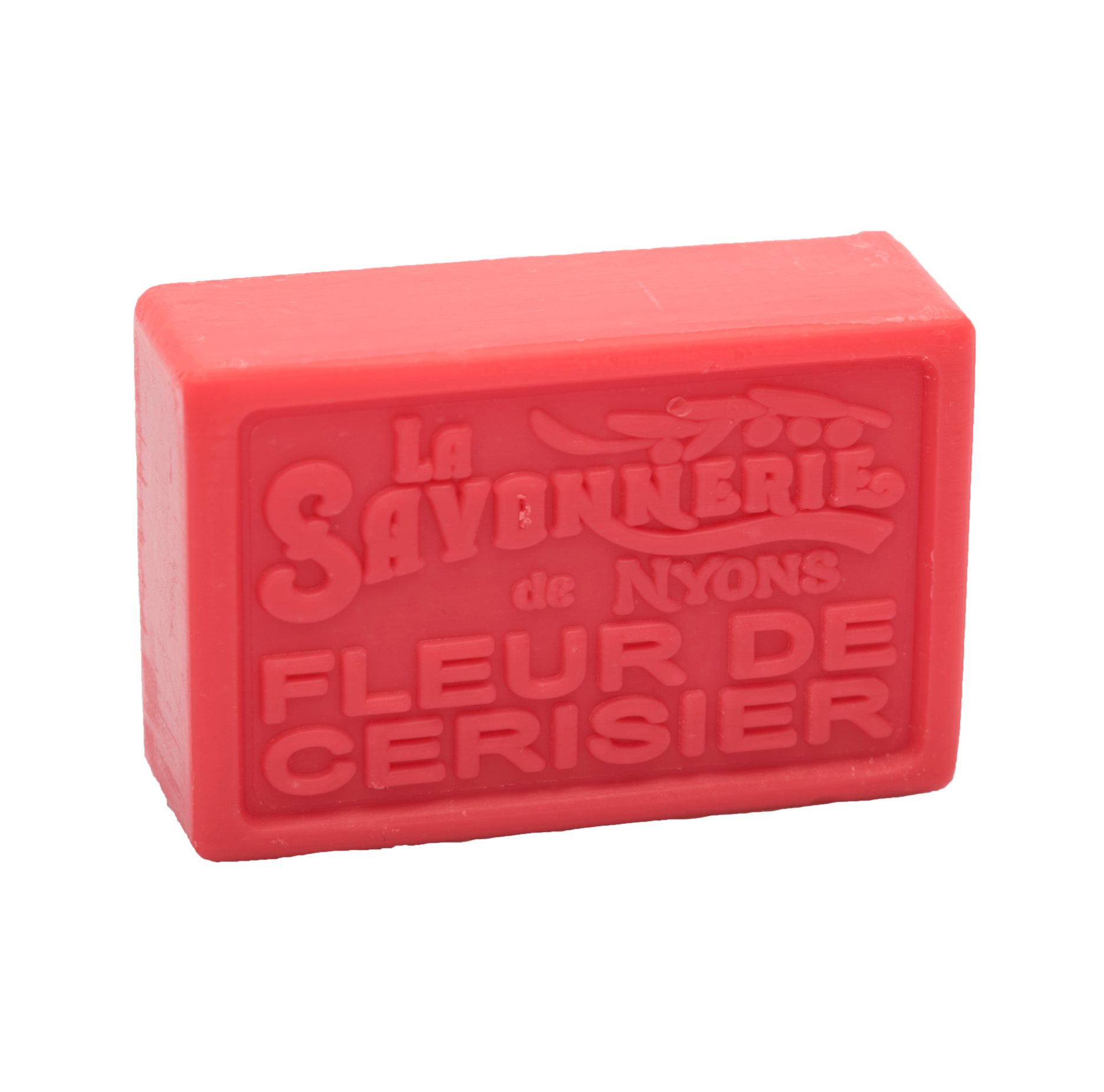 Red bar of soap with stamp reading La Savonnerie de Nyons Fleur de Cerisier.