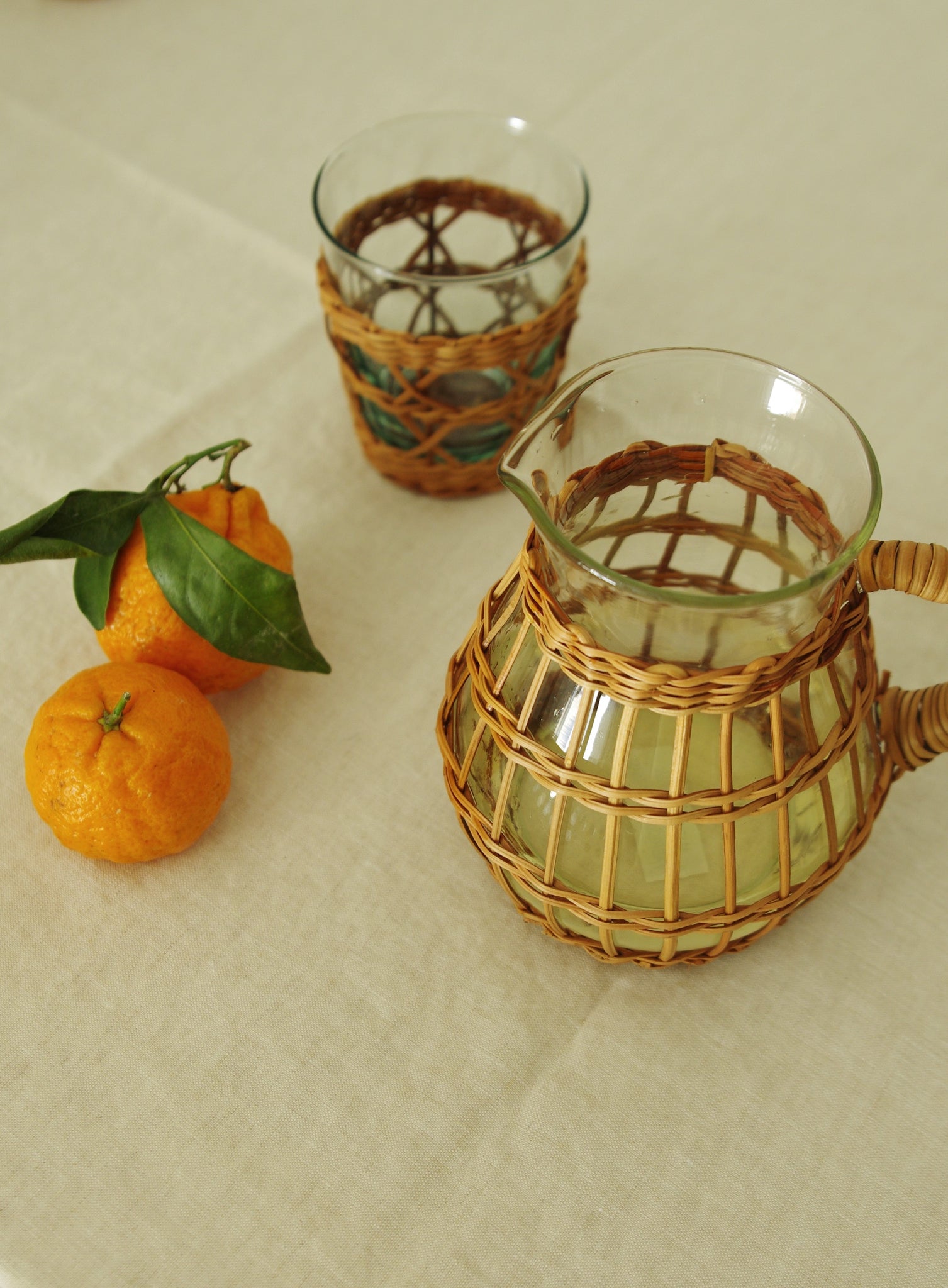 Small Rattan Wrapped Glass Pitcher with Handle