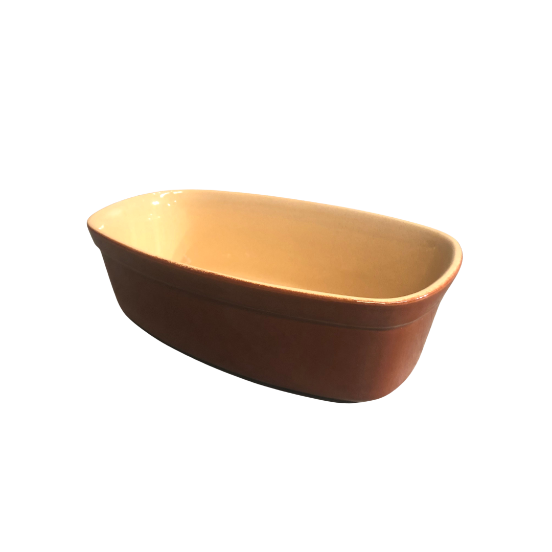 Rectangular Vintage French terrine baking dish in brown ceramic with a cream color interior.